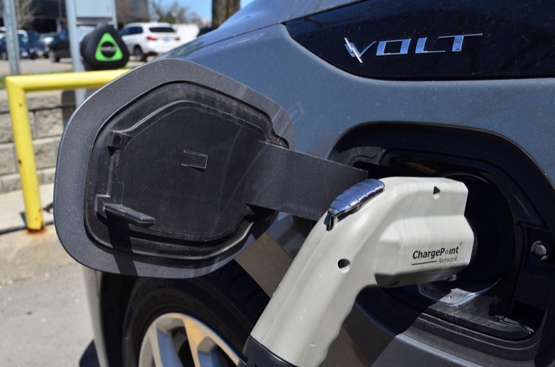 Charging cable plugged into an electric car